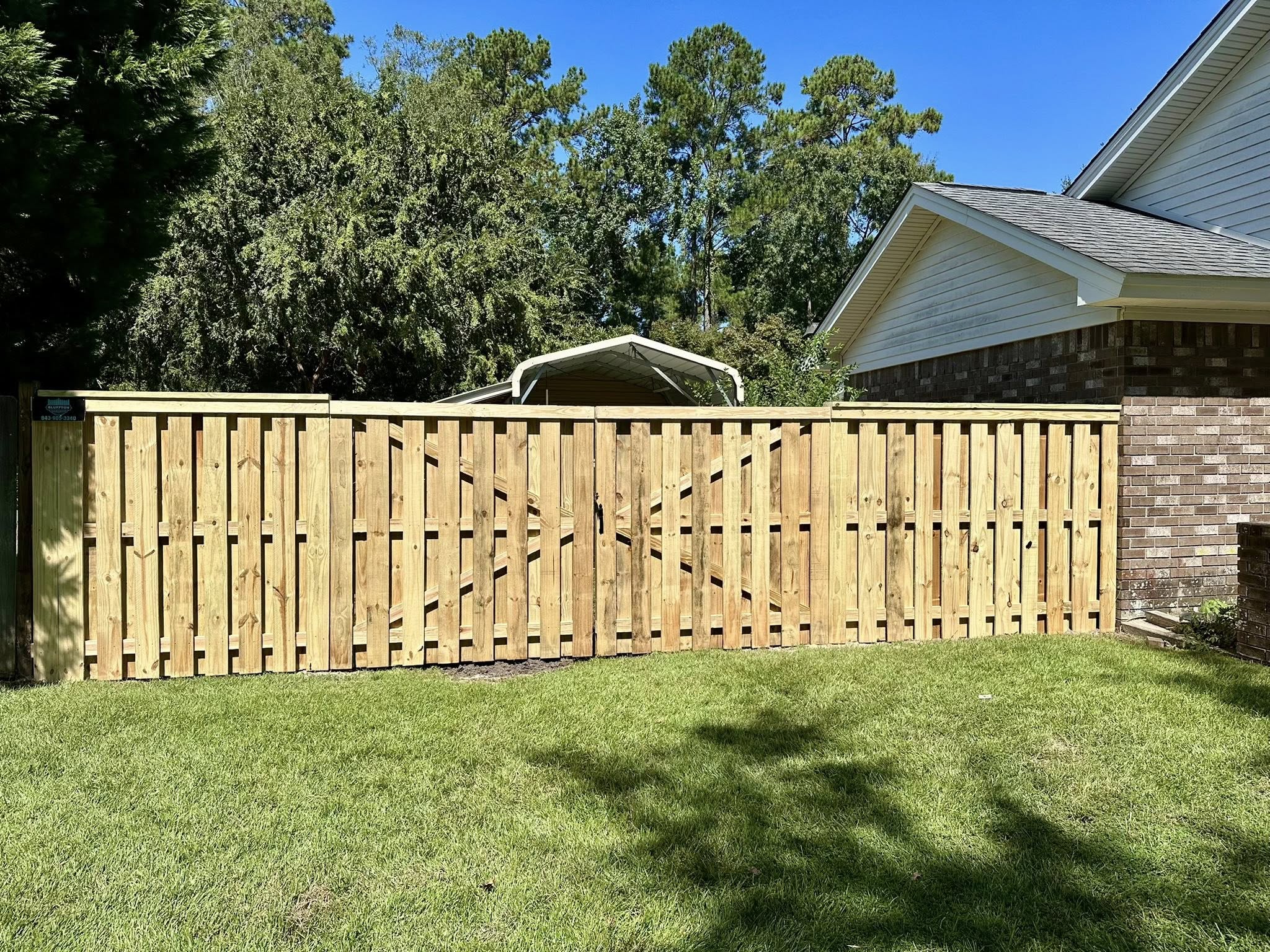 Wood shadowbox fence with double gate, Beaufort County